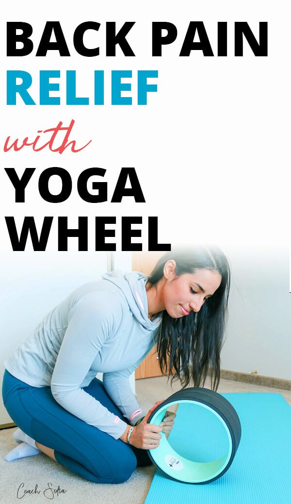 Back pain relief with yoga wheel